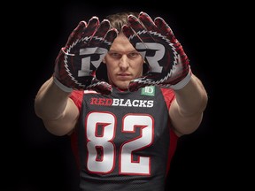 The new adidas-designed Ottawa Redblacks home jersey is modelled here by wide receiver Greg Ellingson. The league’s nine teams all unveiled new jerseys on Thursday, May 12, 2016.