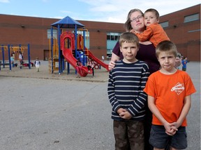 Tanya Hein, seen with her kids, Joshua, Spencer and Elliot at elementary school in Stittsville, hopes there will be a public high school in Stittsville by the time her children are old enough to enrol.