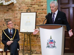 Jeopardy! host Alex Trebek jokes with Ottawa Mayor Jim Watson after he was presented the keys to the city on Thursday.