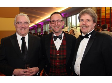 John Ouellette, vice president of philanthropy for the Ottawa Regional Cancer Foundation, is flanked by prominent cancer research scientists Dr. John Bell, left, and Dr. Doug Gray, at the Loft Gala held at the Hilton Lac Leamy on Saturday, April 30, 2016, to raise funds for the Ottawa Regional Cancer Foundation.