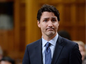 A contrite Prime Minister Justin Trudeau answers questions from opposition MPs in the House of Commons Thursday.