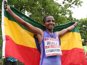 Koren Jelela of Ethiopia is the first women to cross the finish line with a time of 2:27:05 in the Scotia Bank Ottawa Marathon, held in downtown Ottawa, during the Tamarack Ottawa Race Weekend, on May 29, 2016. (Jana Chytilova/Ottawa Citizen) ORG XMIT: 0530 racewknd 123758