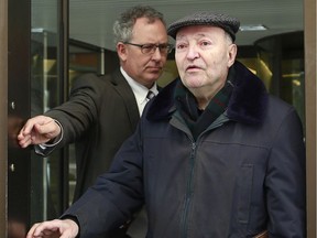February 14, 2013 — Jacques Faucher, 76, leaves on bail (following charges of gross indecency and indecent assault on a seven-year-old boy dating back to between 1971-73) from the Elgin Street courthouse with his lawyer Denis Cadieux (rear).