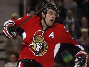 Ottawa Senators defenseman Chris Phillips (4) celebrates his last second goal during third period NHL action at Scotiabank Place Thursday, October 22, 2009. The predators won in over time 6-5.