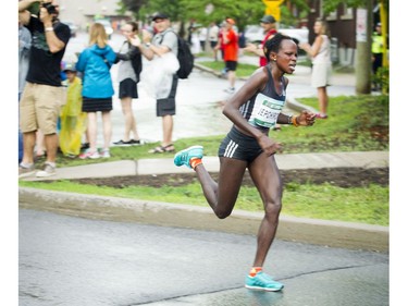 Peres Jepchirchir keeps driving forward toward victory during the 10K race.