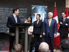 Prime Minister Justin Trudeau visited the Perimeter Institute for Theoretical Physics in Waterloo, Ont. on April 15. Science Minister Kirsty Duncan (centre) says Canada's new Chief Science Officer will have a range of responsibilities.