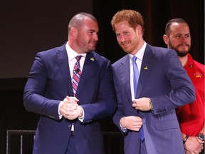 Prince Harry meets Coun. Jody Mitic at the launch of the 2017 Invictus Games to be held in Toronto on Monday May 2, 2016.