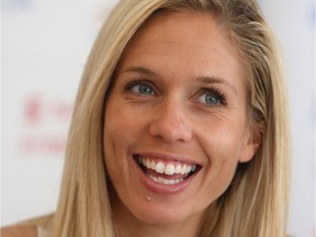 Runner Natasha Wodak talks during a press conference in Ottawa Thursday May 27, 2016