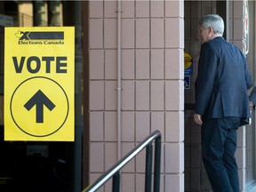 Conservative Leader Stephen Harper arrives to cast his ballot on Oct. 19, 2015. The Liberal governments says that was the last federal election that will be held under the first-past-the-post system.