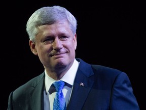 Former prime minister Stephen Harper leaves the stage after addressing delegates during the 2016 Conservative Party Convention in Vancouver, B.C. on Thursday May 26, 2016.