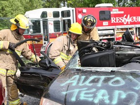 Students took part in a first responder rescue techniques including extrication seminar with Ottawa Firefighters.. The students will be both 'victims' and rescuers and get to use the heavy extrication equipment. Photo by Jean Levac