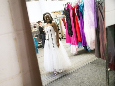 Fairy Godmother Ottawa held its annual free prom dress day at Browns Cleaners. Anuarite Manyoha, with the help of fairy godmother Mary Taggart, tried on a dress that was beautiful but just not right.