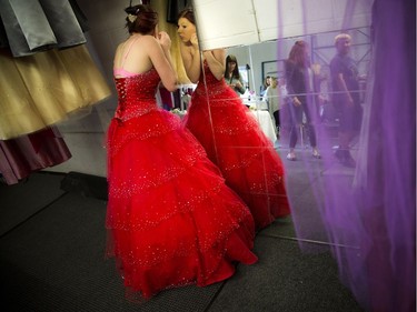 Fairy Godmother Ottawa held its annual free prom dress day at Browns Cleaners. Tatiana Leavitt, 16, lucked out with the help of fairy godmother Mary Ann MacIntosh and found a beautiful red gown and red shoes to match.