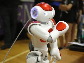 The NAO, the Watson Powered IBM Robot, dances at the 14th Annual IEEE Ottawa Robotics Competition at Longfields-Davidson Heights Secondary School in Ottawa on Saturday, May 28, 2016.