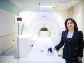 The Royal Ottawa Mental Health Centre officially opened its Brain Imaging Centre, a state of the art research facility featuring a new PET-fMRI machine. This machine is the first of its kind in Canada solely dedicated to mental health research. Dr. Fakhereh Mirrashed, Manager of The Royal's Brian Imaging Centre in the room with the PET-fMRI machine.