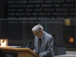 Holocaust survivor Fritz Glickstein reads names during the annual Names Reading ceremony to commemorate those who perished in the Holocaust, in the Hall of Remembrance at the United States Holocaust Memorial Museum, May 2, 2016, in Washington, D.C.
