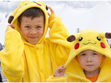 William, 7, and Mathieu Marchand, 4, dressed as Pikachu as Ottawa Comiccon 2016 got underway at the EY Centre.