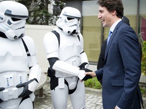 Prime Minister Justin Trudeau visits CHEO's Research Institute laboratories and takes a moment to greet a couple Stormtrooper's outside CHEO. Photos by Ashley Fraser