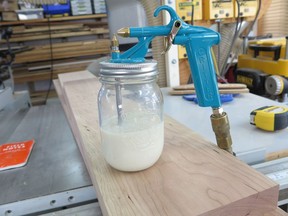 This is one of the simplest, most effective and easiest sprayers to use and clean. No valve to clog up, and a standard mason jar works as a paint pot.
