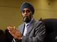 Minister of National Defence Minister Harjit Sajjan appears as a witness at a National Security and Defence Senate committee in Ottawa on Monday, May 30, 2016. THE CANADIAN PRESS/Sean Kilpatrick ORG XMIT: OTTK105