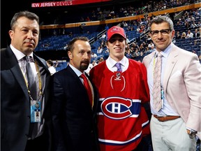 William Bitten poses with Canadiens brass after being selected 70th.