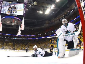 Roman Polak #46 of the San Jose Sharks and Martin Jones #31 react after a second period goal by Phil Kessel #81 of the Pittsburgh Penguins (not pictured) in Game Two of the 2016 NHL Stanley Cup Final at Consol Energy Center on June 1, 2016 in Pittsburgh, Pennsylvania.