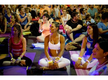 A yoga class was a rare sight to see on Bank Street, if was part of Glowfair Festival Friday June 17, 2016.