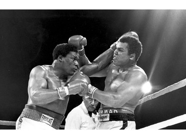 Muhammad Ali, right, takes a punch fromTrevor Berbick,of Canada, during the first round of their 10-round bout in Nassau, Bahamas, in this Dec. 11, 1981 file photo.  Ali, who lost on a unanimous decision, fought his last fight.