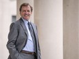 Allan Rock, president of the University of Ottawa, is photographed on the steps outside Tabaret Hall.