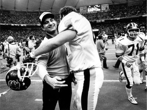 Coach Bob O'Billovich gets a monster hug after the Argos beat the B.C. Lions in the Grey Cup.