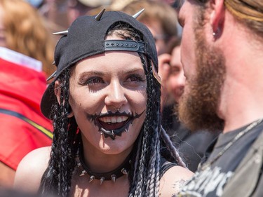 Daryl Leblanc takes in the sights as the annual Amnesia Rockfest invades the village of Montebello in Quebec, about an hour away from Ottawa and Montreal.