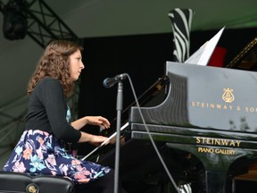 Pianist Amanda Tosoff in Confederation Park at the 2016 TD Ottawa Jazz Festival.