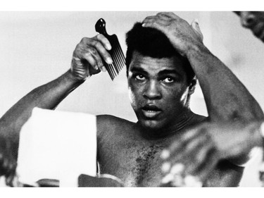 (FILES) This file photo taken on October 19, 1974 shows US boxing heavyweight champion Muhammad Ali (born Cassius Clay) 11 days before the heavy weight world championship  in Kinshasa.  Boxing icon Muhammad Ali died on Friday, June 3, a family spokesman said in a statement. "After a 32-year battle with Parkinsons disease, Muhammad Ali has passed away at the age of 74," spokesman Bob Gunnell said. /