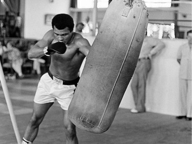 (FILES) This file photo taken on October 27, 1974 shows former world heavyweight champion Muhammad Ali during a training session in Kinshasa, Zaire, before his world heavyweight championship fight against titleholder US George Foreman on October 30, 1974. Ali won by knocking out Foreman in the eighth round. Heavyweight boxing legend Muhammad Ali, an icon of the 20th Century whose fame transcended the sport during a remarkable career that spanned three decades, died June 3, 2016, his family said.  /
