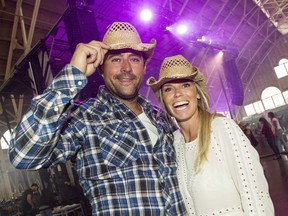 Former Ottawa Senators defenceman Chris Phillips, left, and his wife, Erin, party during the #Ottawa4FortMac fundraising event at the Aberdeen Pavillion Wednesday June 8, 2016 in support of the Canadian Red Crosss emergency appeal and the United Ways relief efforts directed towards helping the residents of Fort McMurray rebuild their lives and their community.