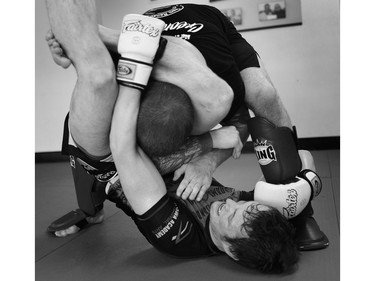 Stonehouse looks to apply a leg triangle to his coach.
