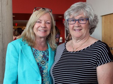 From left, Bobbie Cain and Ann Matthews, both volunteers at the Parkdale Food Centre, were out to support its Branching Out Gala, held at the home of The GCTC on Thursday, June 23, 2016. (Caroline Phillips / Ottawa Citizen)