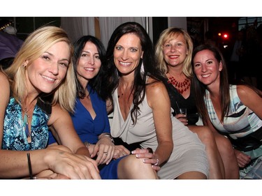 From left, Krista Thompson, Arlie Koyman, Nadine Sabine, Kellie Major and Shannon Lambert from sponsor Veritaaq cozy up together on one of the lounge couches at the Bash 2016: London Calls fundraiser for the Snowsuit Fund, held at the Horticulture Building at Lansdowne on Friday, June 10, 2016.