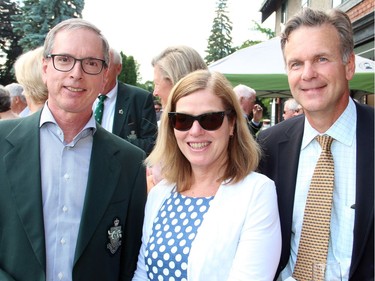 From left, Peter Johns and Karen Johns with TD Bank vice president Doug Feasby, also vice president of the Royal Ottawa Golf Club, at the opening cermony and cocktail reception to celebrate the 125th anniversary private golf club, held Wednesday, June 29, 2016.