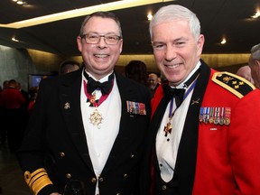 From left, Vice-Admiral Mark Norman with Lt-Gen. Guy Thibault at the Battle of the Atlantic Gala Dinner, held at the Canadian War Museum on Thursday, April 28, 2016. (Caroline Phillips / Caroline Phillips)