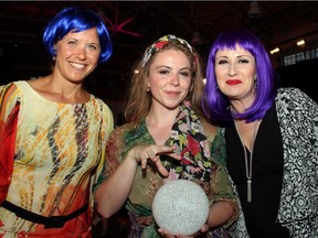 From left, volunteers Carmen Crinjala and Lydia Riding with event committee chair Rhiannon Andrews at the carnival-inspired Stepping Out gala, held Thursday, June 16, 2016, in support of Dress for Success, a non-profit organization that helps women get back into the workplace.