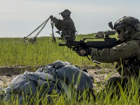 German Special Forces paratroopers secure the drop zone at Jimmy Lake Range, Saskatchewan during Exercise MAPLE FLAG on June 6, 2016.

Photo: Cpl Manuela Berger, 4 Wing Imaging
CK01-2016-0510-053