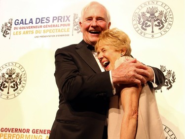 Gov. Gen. David Johnston gives his wife, Sharon, a squeeze during their red carpet arrival to the Governor General's Performing Arts Awards Gala, held at the National Arts Centre on Saturday, June 11, 2016.