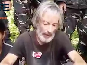 Abu Sayyaf, the Philippine militant group behind the murder of Canadian hostage John Ridsdel, has reportedly released a new video apparently showing Canadian hostage Robert Hall pleading with the government to “meet the demand” of his captors.