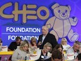 JJ Clarke participates in the CHEO Telethon at the EY Centre.