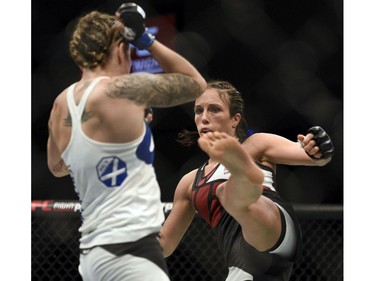Joanne Calderwood, left, fights Valerie Letourneau in a women's flyweight bout during UFC Fight Night: MacDonald vs. Thompson at TD Place Arena Saturday June 18, 2016.