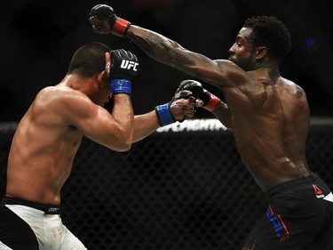 Joe Soto, left, dodges a swing from Chris Beal in a prelim Bantamweight bout.