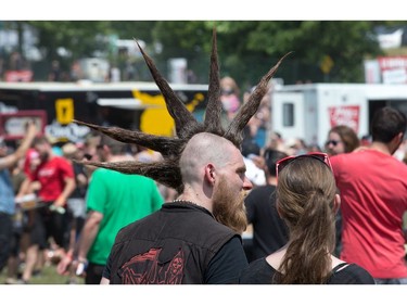Johnny sports spikes as the annual Amnesia Rockfest invades the village of Montebello in Quebec, about an hour away from Ottawa and Montreal.
