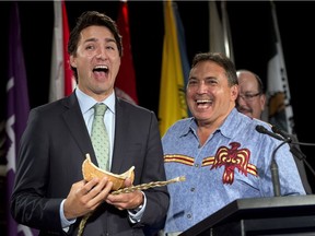 Justin Trudeau receives a gift of sweetgrass and a canoe from National Chief Perry Bellegarde after addressing the Assembly of First Nations congress in Montreal last summer, before he became prime minister.