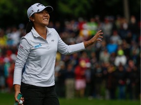 Leader Lydia Ko of New Zealand waves to the crowd after completing the third round of the KPMG Women's PGA Championship at Sahalee Country Club on June 11, 2016 in Sammamish, Washington.